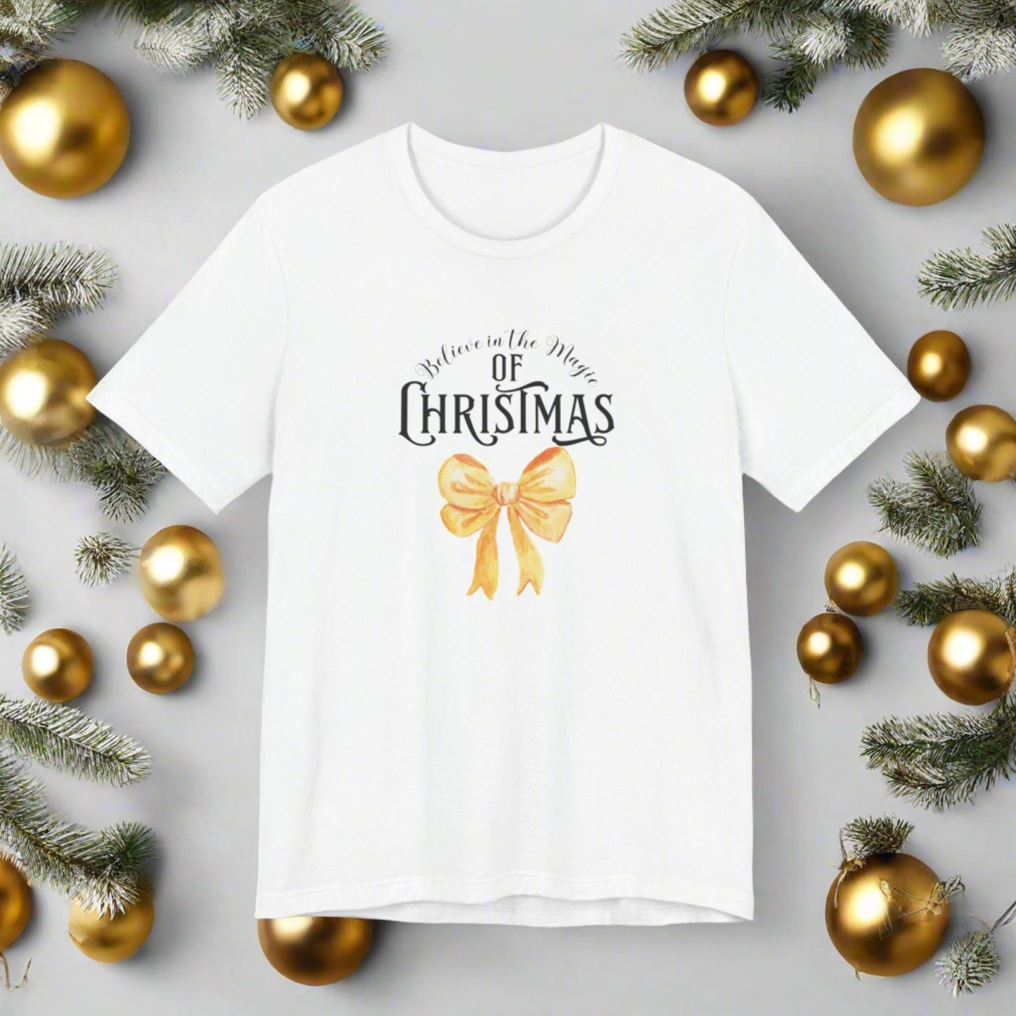 The Magic of Christmas Bow Gold Tee