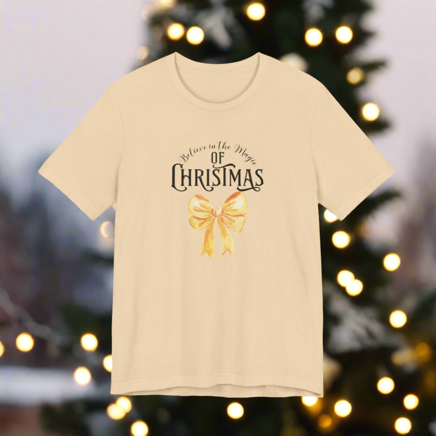 The Magic of Christmas Bow Gold Tee