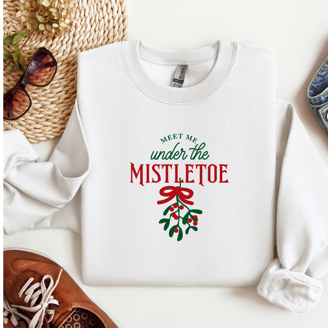 🎄MEET ME UNDER THE MISTLETOE Unisex Heavy Blend™ Crewneck